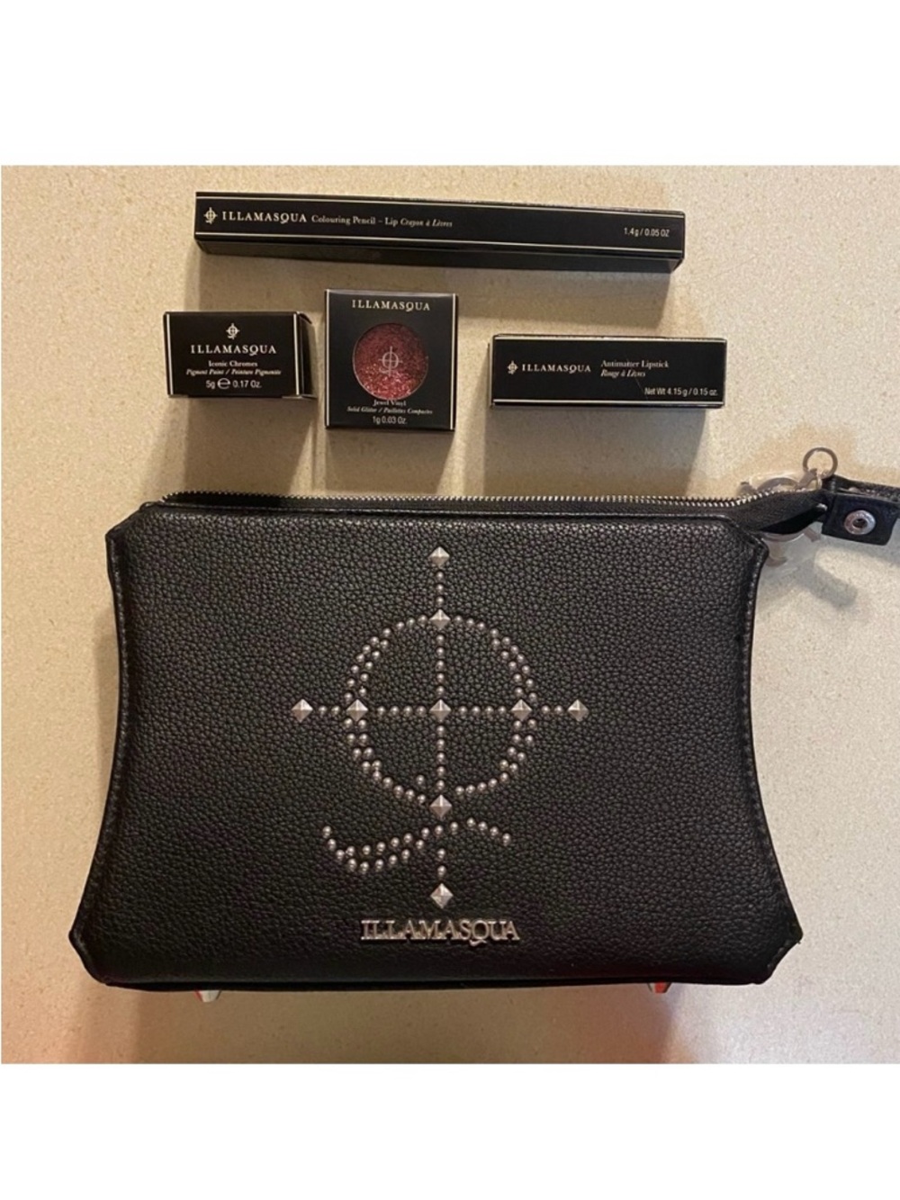 Illamasqua Limited Edition Reign of Rock studded makeup bag with products! 💄💋